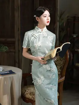 2023 Лятото Ново елегантна рокля Ципао средна дължина в китайски стил със средна дължина, с подобрен ретро-темперамент за да проверите за свободни схващания за жените
